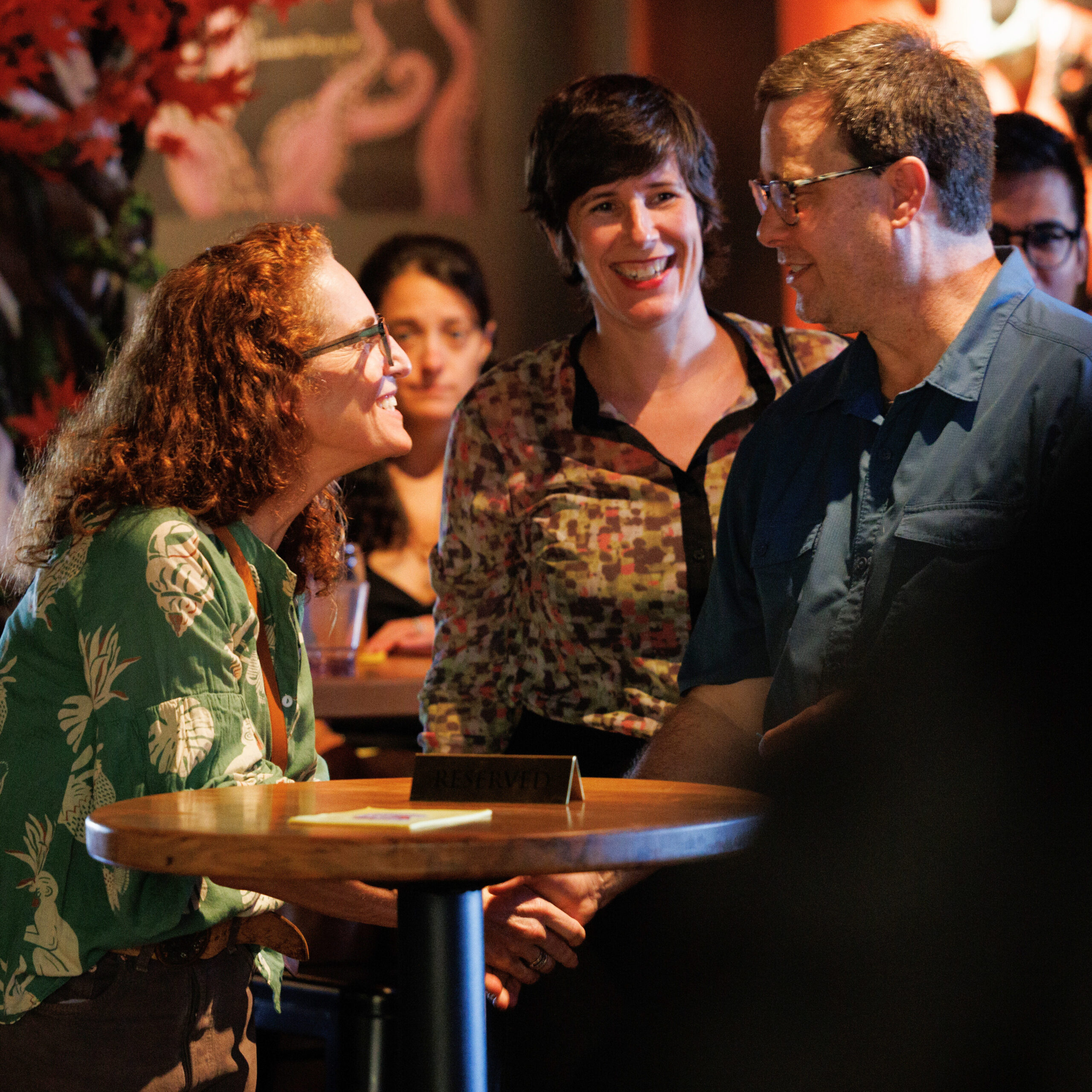 People chatting in a bar